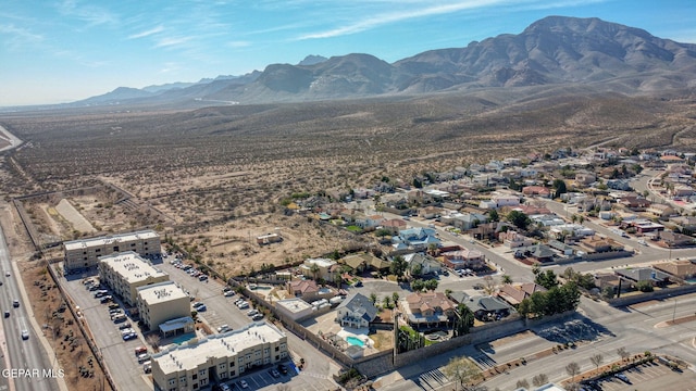 drone / aerial view featuring a mountain view