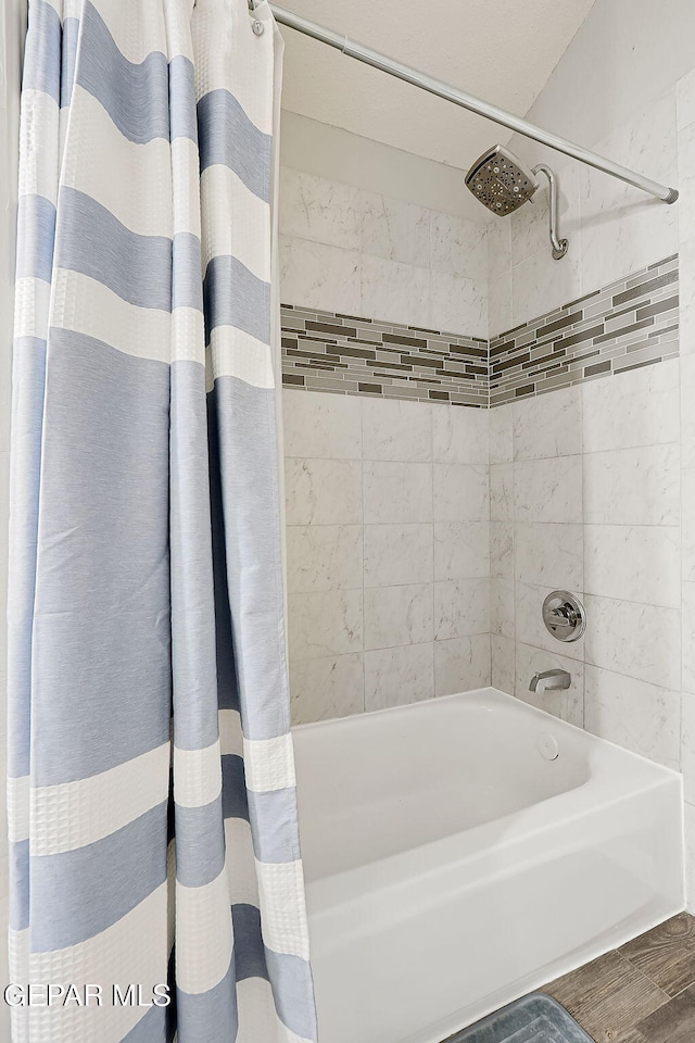 bathroom with shower / bath combo