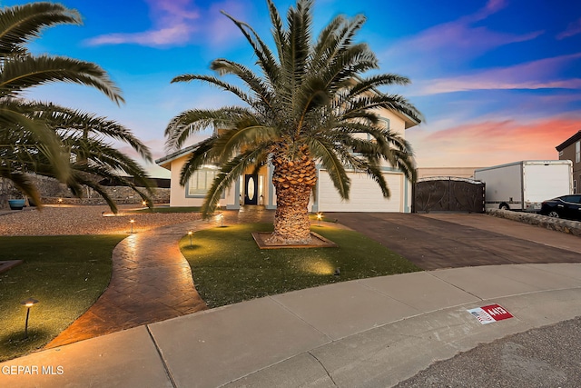 view of front of property with a lawn