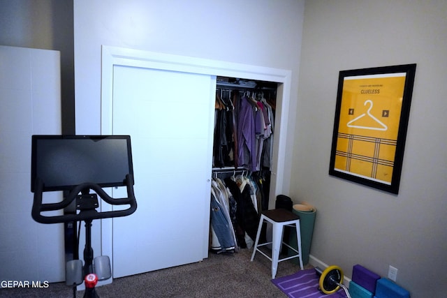 carpeted bedroom with a closet