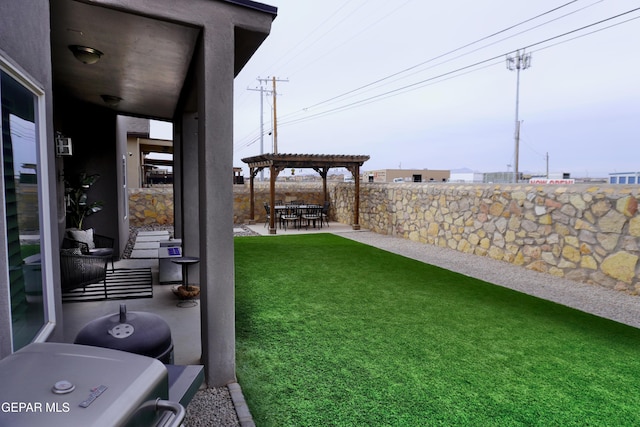 view of yard with a patio area and a pergola