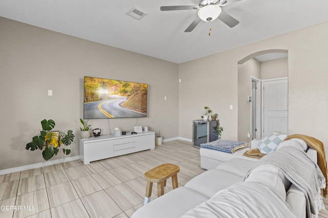 living room with ceiling fan