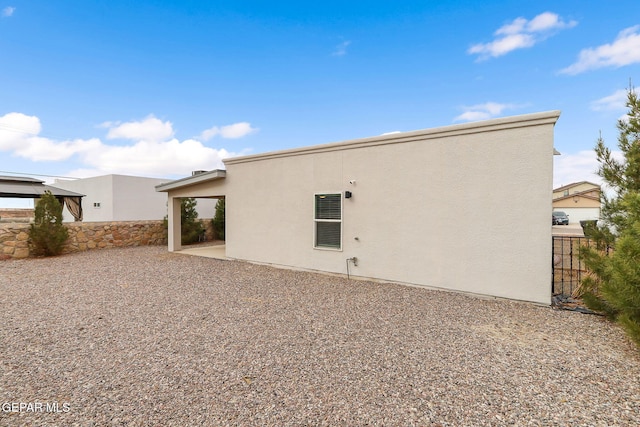 rear view of property with a patio area