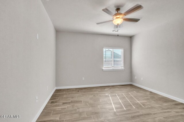 spare room featuring ceiling fan