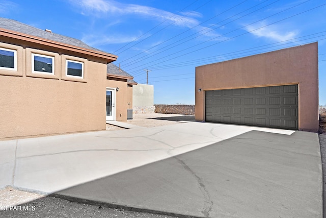 exterior space featuring a garage