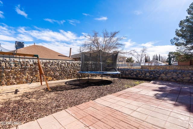 view of patio featuring a trampoline