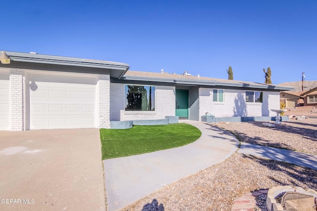 ranch-style home with a garage