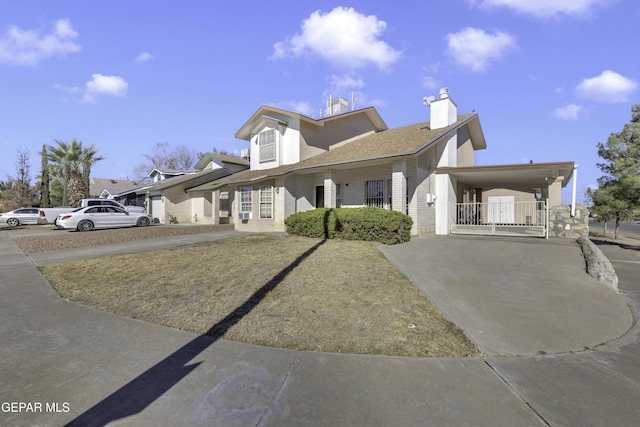 view of front of house featuring a carport