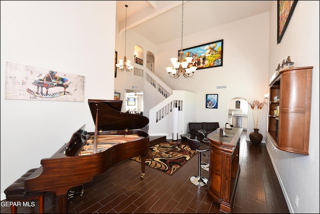 550 Shadow Willow Dr, El Paso, TX 79922 - living room featuring beam ceiling, high vaulted ceiling, and an inviting chandelier