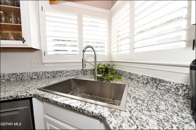 550 Shadow Willow Dr, El Paso, TX 79922 - details featuring white cabinetry, sink, dishwasher, and light stone counters