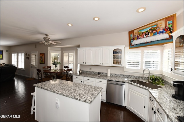 550 Shadow Willow Dr, El Paso, TX 79922 - kitchen with sink, white cabinets, stainless steel dishwasher, and a kitchen island