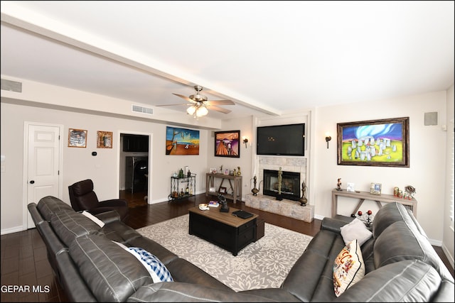 550 Shadow Willow Dr, El Paso, TX 79922 - living room with beam ceiling, dark hardwood / wood-style flooring, ceiling fan, and a tiled fireplace