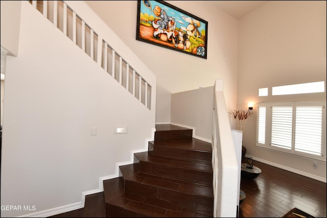 550 Shadow Willow Dr, El Paso, TX 79922 - stairs with wood-type flooring and a towering ceiling