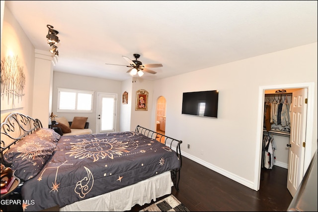550 Shadow Willow Dr, El Paso, TX 79922 - bedroom featuring ceiling fan, dark hardwood / wood-style flooring, a walk in closet, and a closet