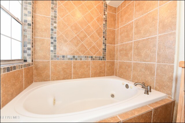 550 Shadow Willow Dr, El Paso, TX 79922 - bathroom featuring a relaxing tiled tub