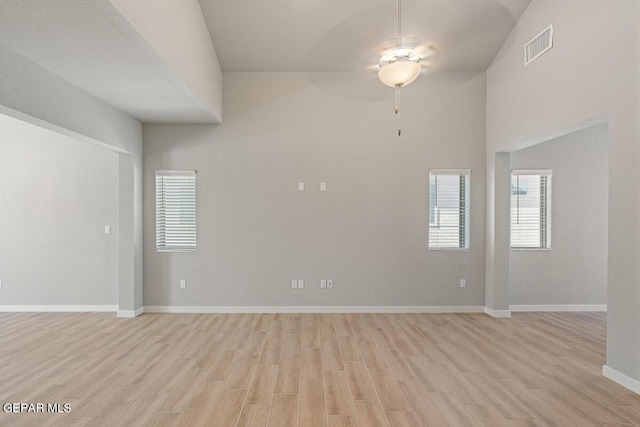 spare room featuring light wood-type flooring