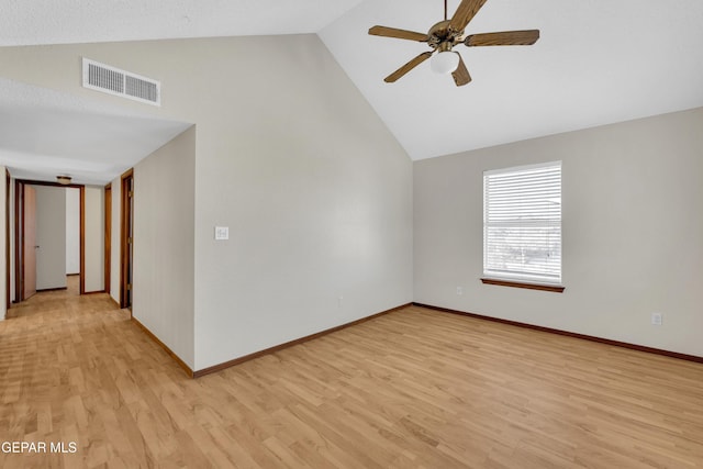 unfurnished room with ceiling fan, light hardwood / wood-style floors, and high vaulted ceiling