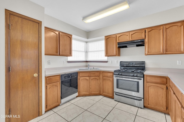 kitchen featuring dishwasher, gas stove, light tile patterned floors, and sink