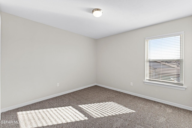 spare room featuring carpet flooring