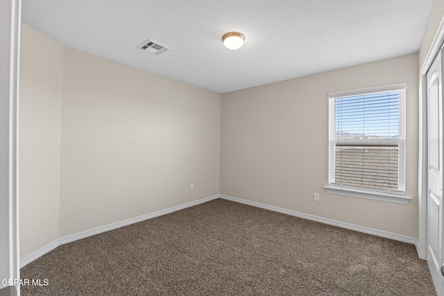 spare room with carpet flooring