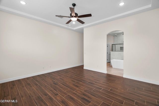 spare room with ceiling fan