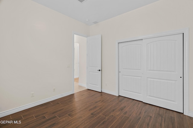 unfurnished bedroom featuring a closet