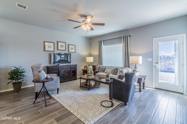 living room featuring ceiling fan