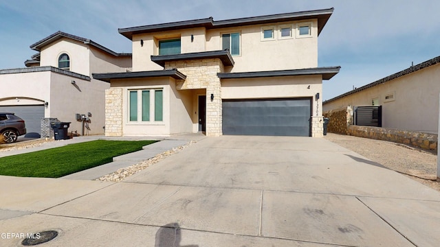 view of front of home with a garage