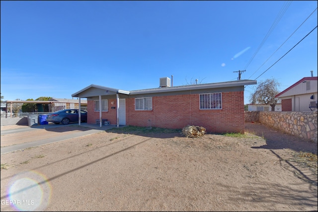 view of front of home featuring central air condition unit