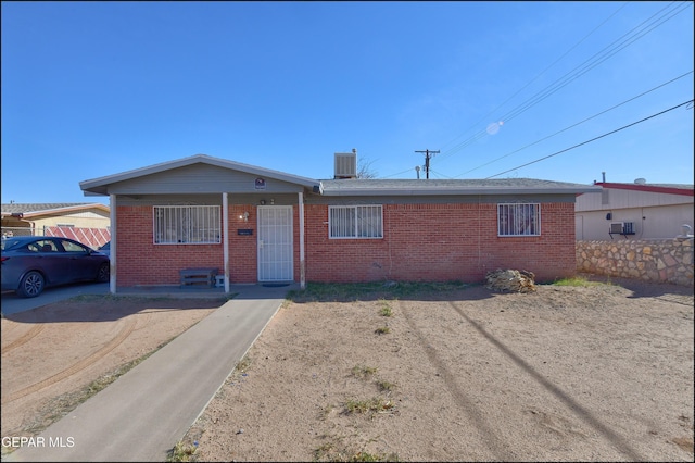 ranch-style home with central AC