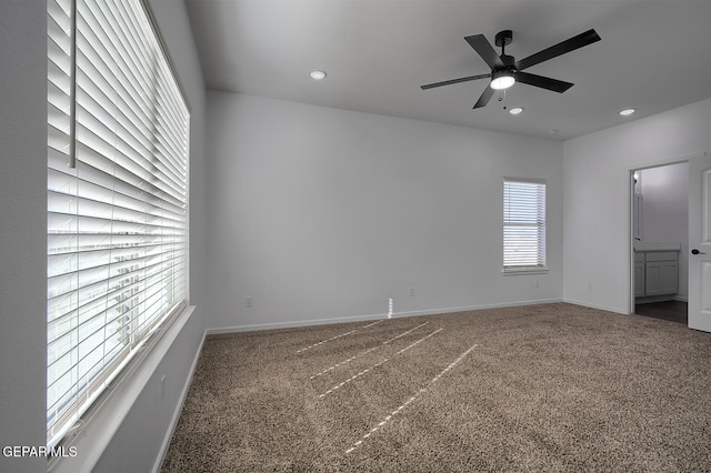 unfurnished bedroom with recessed lighting, carpet, and baseboards