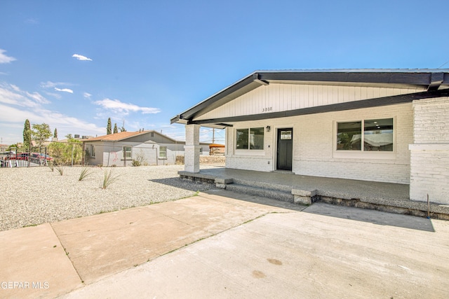 view of front of home featuring covered porch