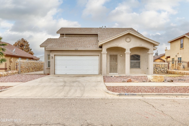 view of front of property featuring a garage