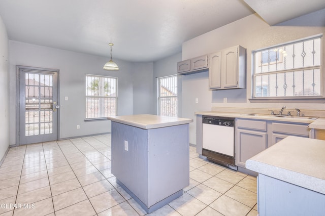 kitchen with gray cabinetry, white dishwasher, light tile patterned floors, a center island, and hanging light fixtures