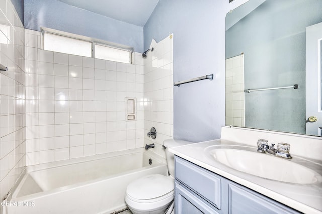 full bathroom with vanity, shower / bathtub combination, and toilet