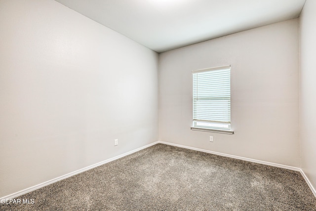 unfurnished room with carpet floors