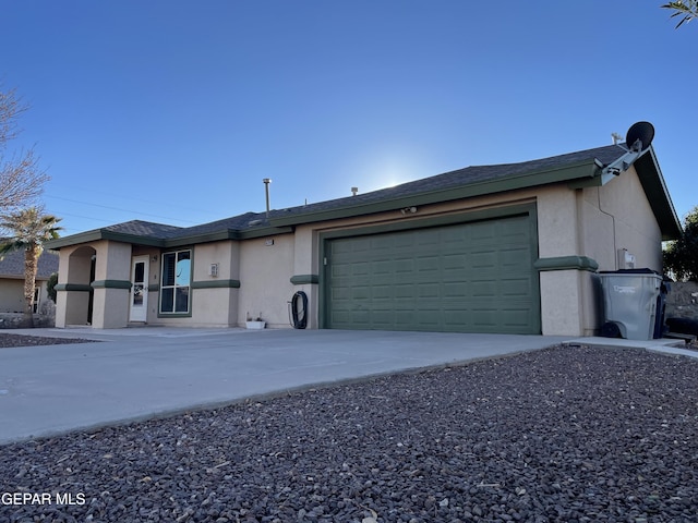 ranch-style home with a garage