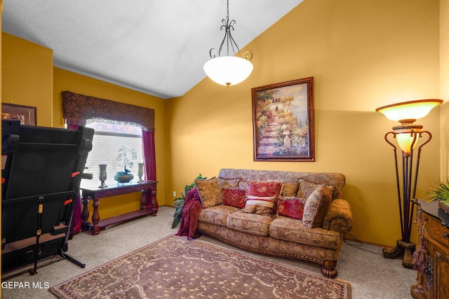 carpeted living room featuring lofted ceiling