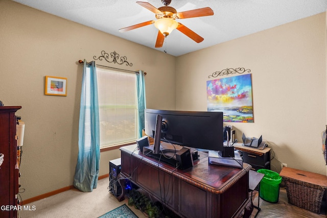 office with ceiling fan and carpet