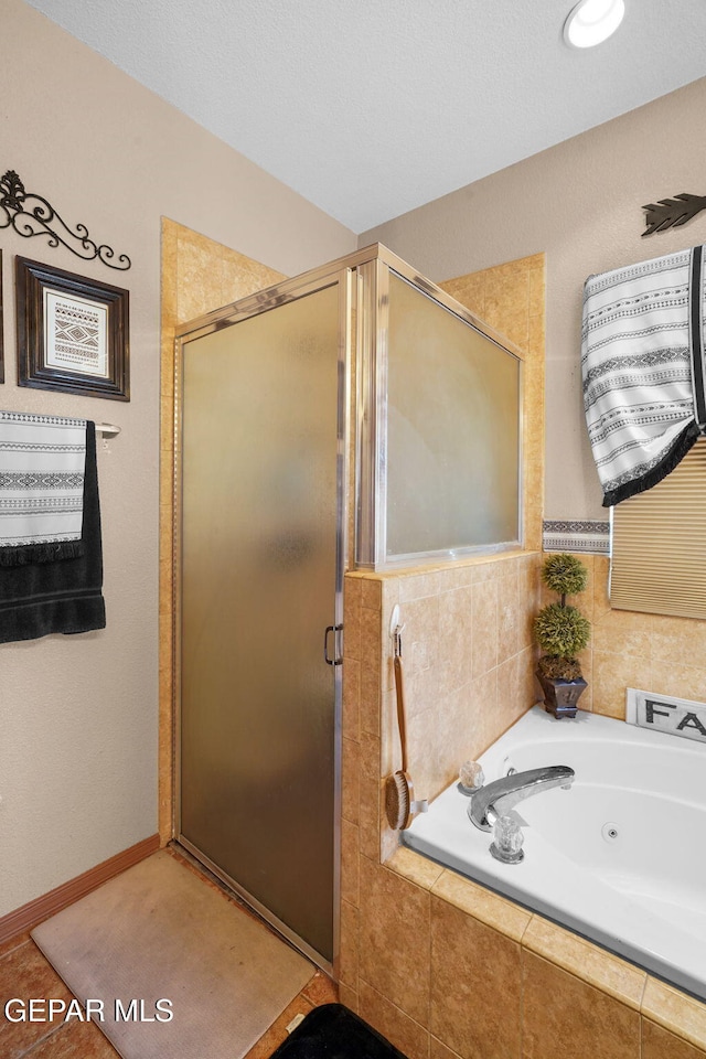 bathroom featuring plus walk in shower and tile patterned floors