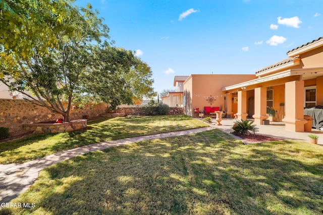 view of yard with a patio area