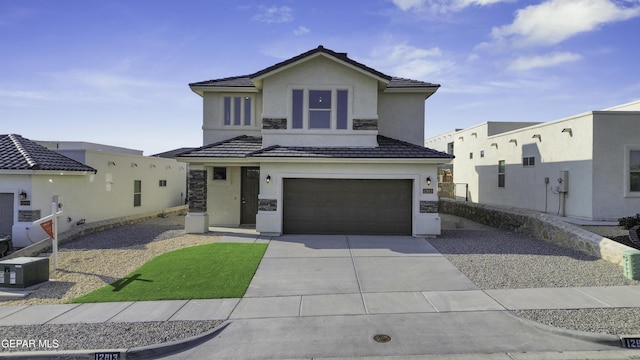 view of front of home with a garage