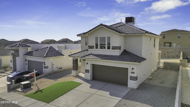 view of front of home with a garage