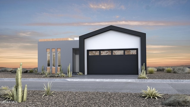 contemporary house featuring a garage