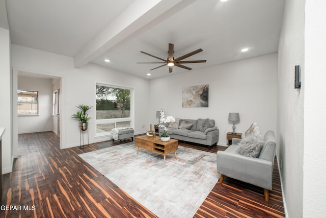 living room featuring beamed ceiling, ceiling fan, and dark hardwood / wood-style floors