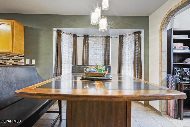 view of tiled dining space