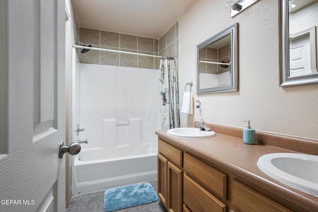 bathroom featuring shower / tub combo with curtain, vanity, and tile patterned flooring