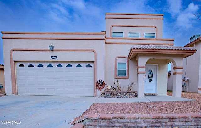 view of front of property with a garage