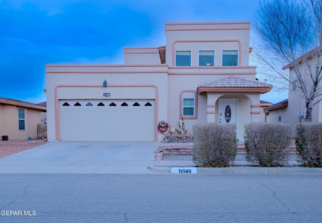 view of front of home with a garage