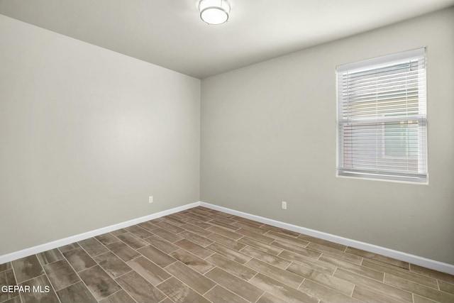 empty room featuring hardwood / wood-style floors